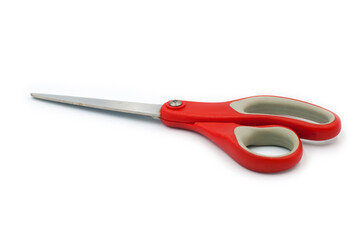 Red scissors on a white background