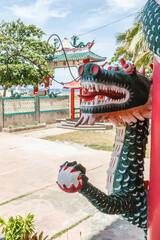 Dragons at Chinese-Philippino Bell Church, City of Dumaguete, Negros Oriental, Philippines. Vertical image. - obrazy, fototapety, plakaty
