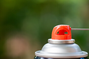 The nozzle of the pesticide spray bottle which is a dangerous substance