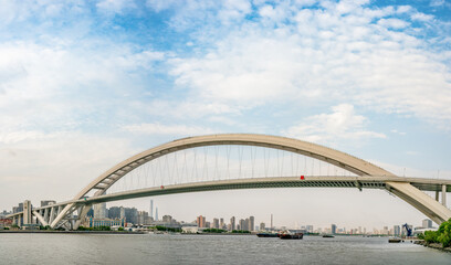 Fototapeta na wymiar Panorama view of Lupu Bridge, on of the biggest bridge on Huangpu river, shot in Shanghai, China.