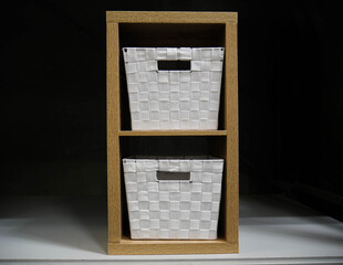 Minimalist shelf with storage cubes.