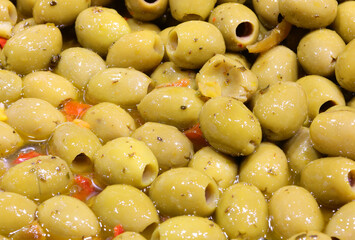 background of green olives for sale