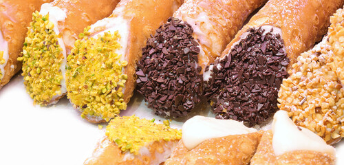many pastries called CANNOLI in Italian Language