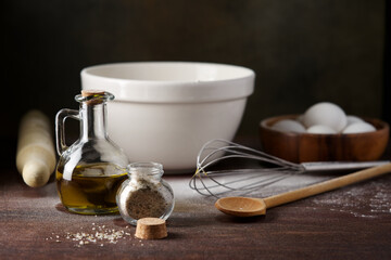 Ingredients and kitchen utensils for making pizza dough or pasta. Home cooking concept