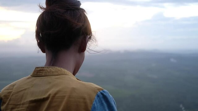 Young girl breathing meditation and commit suicide in nature