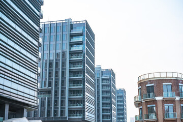 Fototapeta na wymiar The facade of modern buildings in Shanghai, China