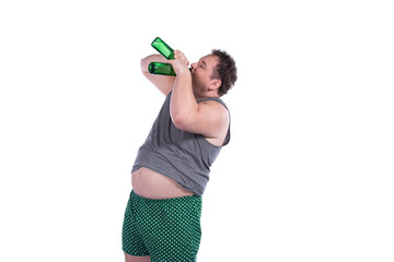 Funny fat man is drinking beer. 