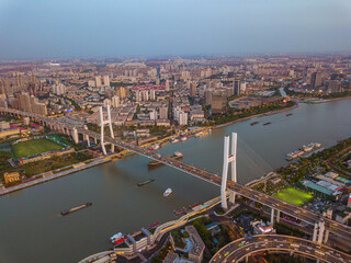 Obraz premium Aerial shot of Nanpu bridge in Shanghai, shot at sunset, in China.