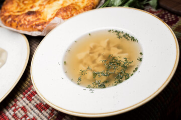soup with meat in a white plate. Georgian national food