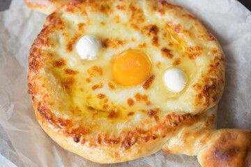 Adjarian khachapuri close up. Georgian cuisine