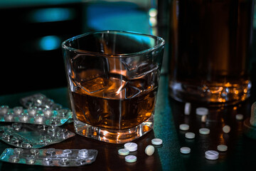 alcohol and pills addiction concept