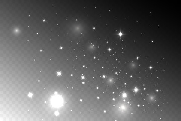 Vector sparkles on a transparent background. Christmas abstract pattern. Sparkling magical dust particles.