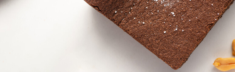 top view of delicious brownie piece on white background, panoramic shot
