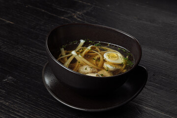 soup with homemade noodles and boiled egg - 361942096