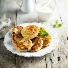 Homemade cottage cheese cakes with raisins