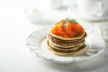 Smoked salmon pancakes with fresh dill