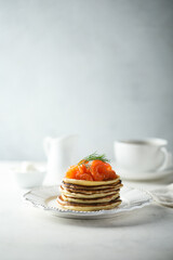 Smoked salmon pancakes with fresh dill