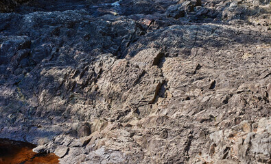 Plain Paleovolcano Girvas.An ancient non-active volcano 2 billion years old. You can see the vent of the volcano and the lake, which was formed in numerous craters. The slopes are rocky