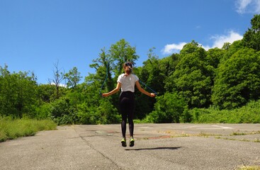Girl jumping rope
