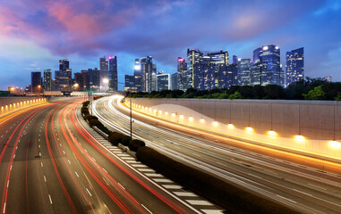 Singapore skyline at night with traffic