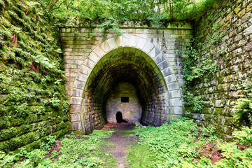 Fototapeta na wymiar Old abandoned tunnel in the underground wine cellar.