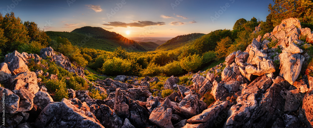 Wall mural Panorama of rocky mountain at sunset, nice landscape