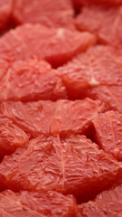 sliced fresh red grapefruit closeup