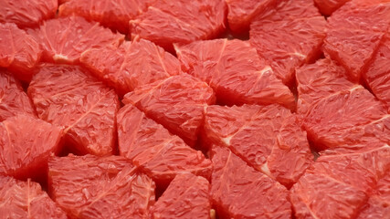 sliced fresh red grapefruit closeup