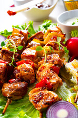 Grilled szaszlyk and meat flares with green salad