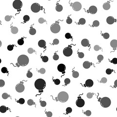 Black Bomb ready to explode icon isolated seamless pattern on white background. Vector Illustration.