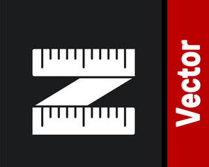 Fototapeta premium White Tape measure icon isolated on black background. Measuring tape. Vector Illustration.