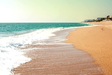 Sandy beach with the sea. Sea landscape tinted