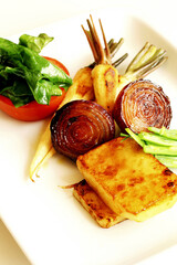 Baked cheese with fried onions