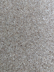 Close up of brown chipboard. Chipboard background