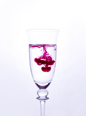 Red dye mixing with water