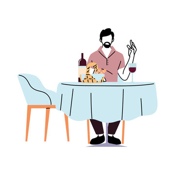 Man sitting at restaurant table with wine and breads basket vector design