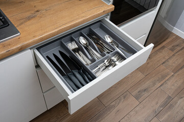 Kitchen drawer with cutlery set - obrazy, fototapety, plakaty