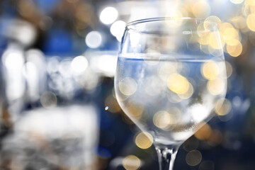 evening in a restaurant, blurred abstract background, bokeh, alcohol concept, wine glasses in a bar