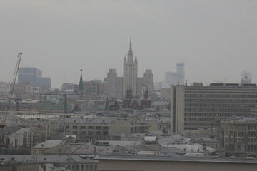 Moscow gloomy view of the city from above, smok ecology city view © kichigin19