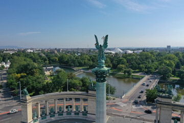 Fototapeta premium Heroes' Square or the Millennium Monument is the most important attraction of the city. Archangel Gabriel at the top of the Corinthian column. Tourist attraction Budapest, Hungary.