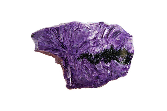Charoite rock. Wide purple abstract background from polished natural.