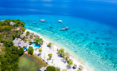 Panorama with a aerial top view as perspective of the Sumilon island beach landing near Oslob, Cebu, Philippines.
