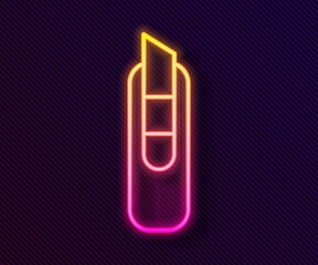 Glowing neon line Stationery knife icon isolated on black background. Office paper cutter. Vector Illustration.