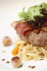 Steak with bacon and linguine