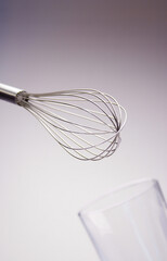 Whisk and glass
