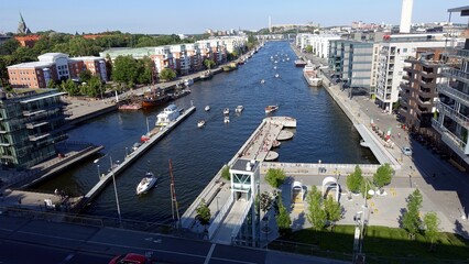 Fototapeta na wymiar Stockholm, Sweden, june 27 2020. A glimpse of the modern district near the water