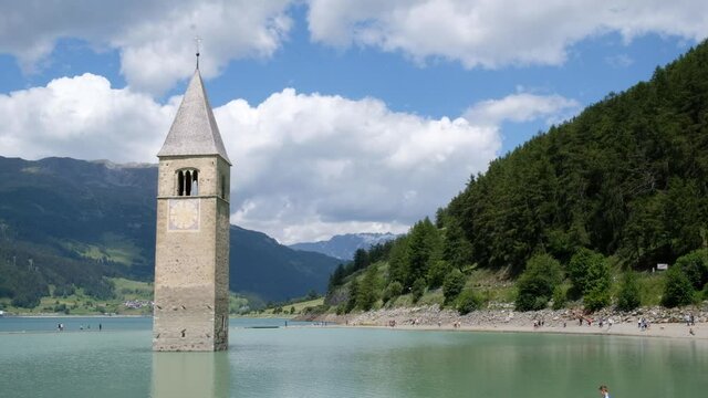 Curon bell tower emerges from the lake Resia - South Tyrol (Italy)
