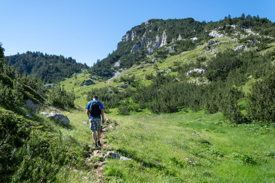 A Lone Hiker In The Mountains.