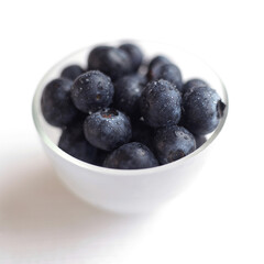 Close up of some blueberries in a bowl