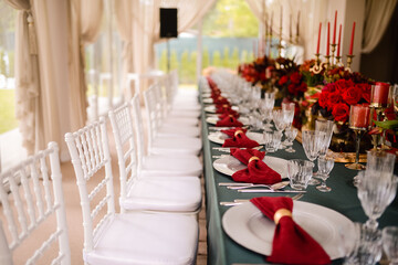 Romantically decorated table for a special event. Red decoration for celebration